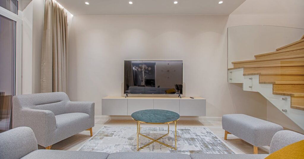 Stylish minimalist living room with modern furniture and warm lighting.